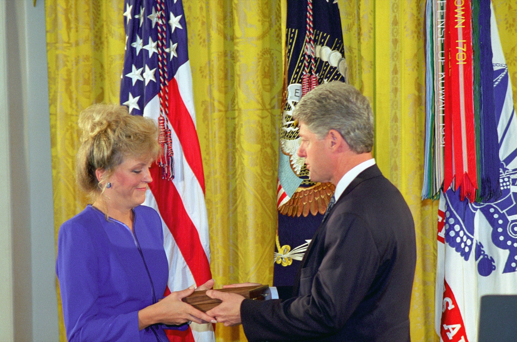 President Clinton presents the Medal of Honor to Carmen Gordon, widow of Master Sergeant Gary Gordon, at the White House.
